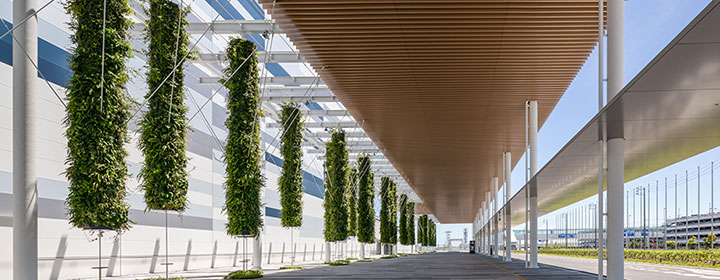 Vertical greening cylinders at Aichi International Convention & Exhibition Center